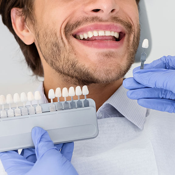 male-getting-teeth-whitened